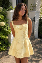 Yellow floral lace corset mini dress front outdoor garden