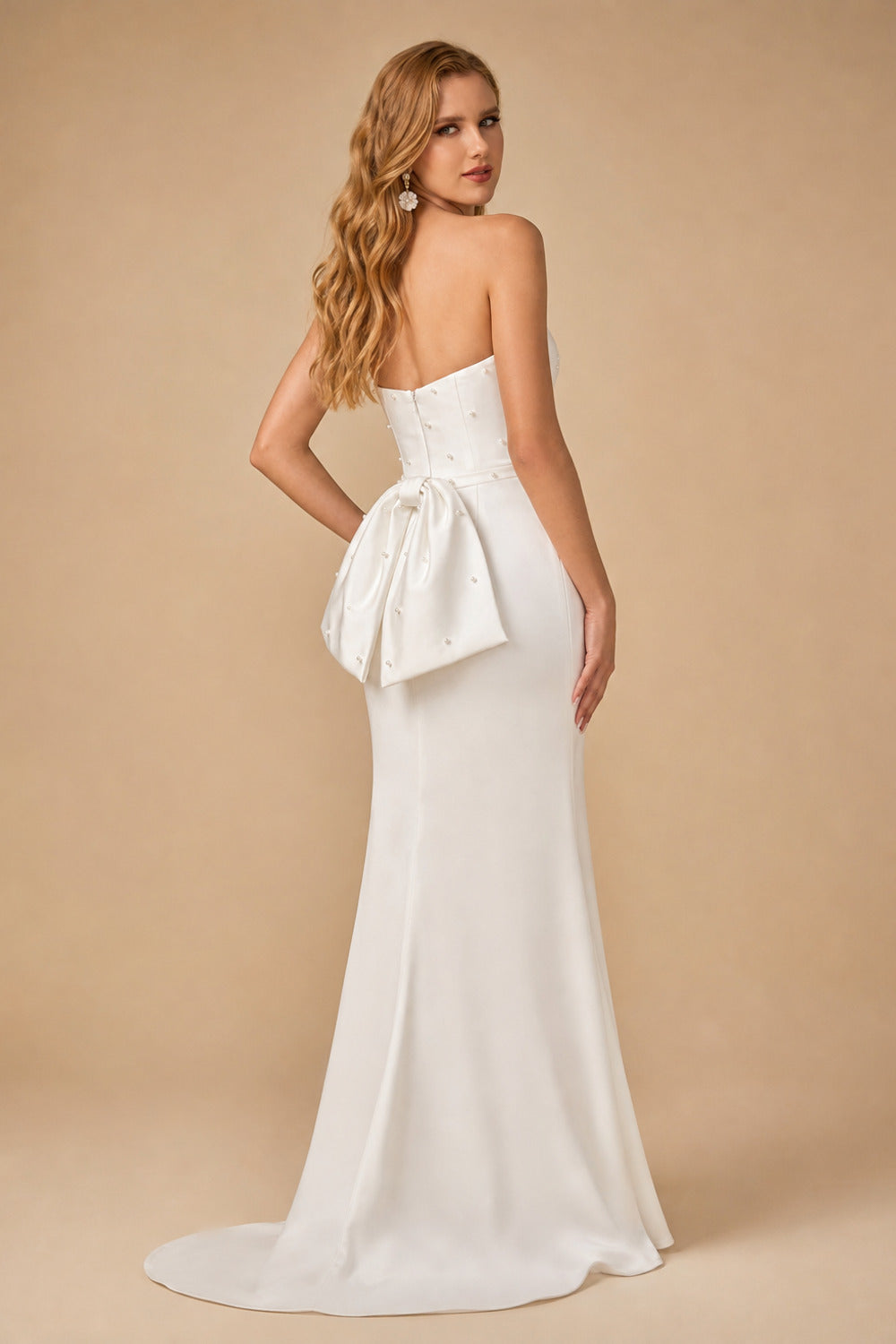 Rutipo Ivory Minimalistic Beaded Strapless Bow Accented Back Wedding Dresses With Back Slit